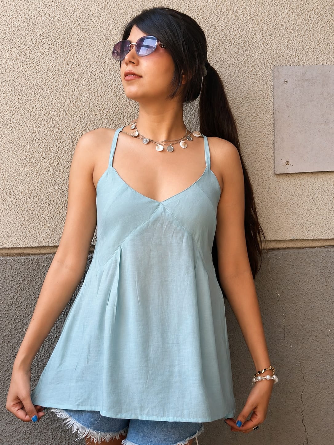 Light pastel blue sleeveless top
